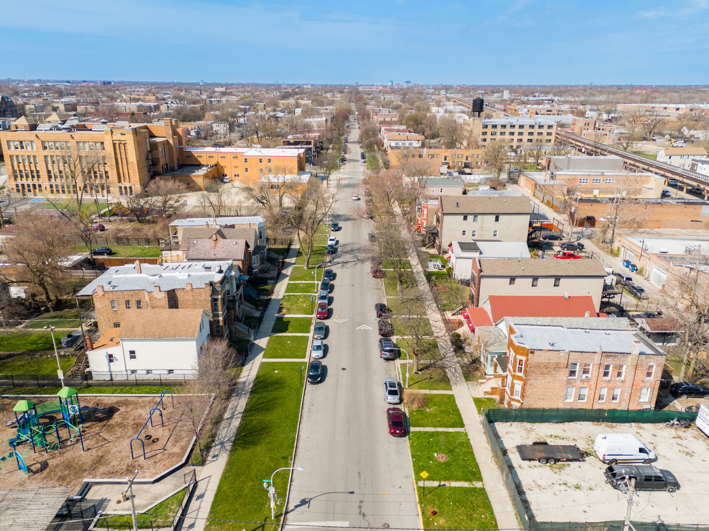 4140 West Maypole Avenue, Unit 2 Chicago, IL 60624 - Photo 21 of 24 an aerial view of residential houses with yard