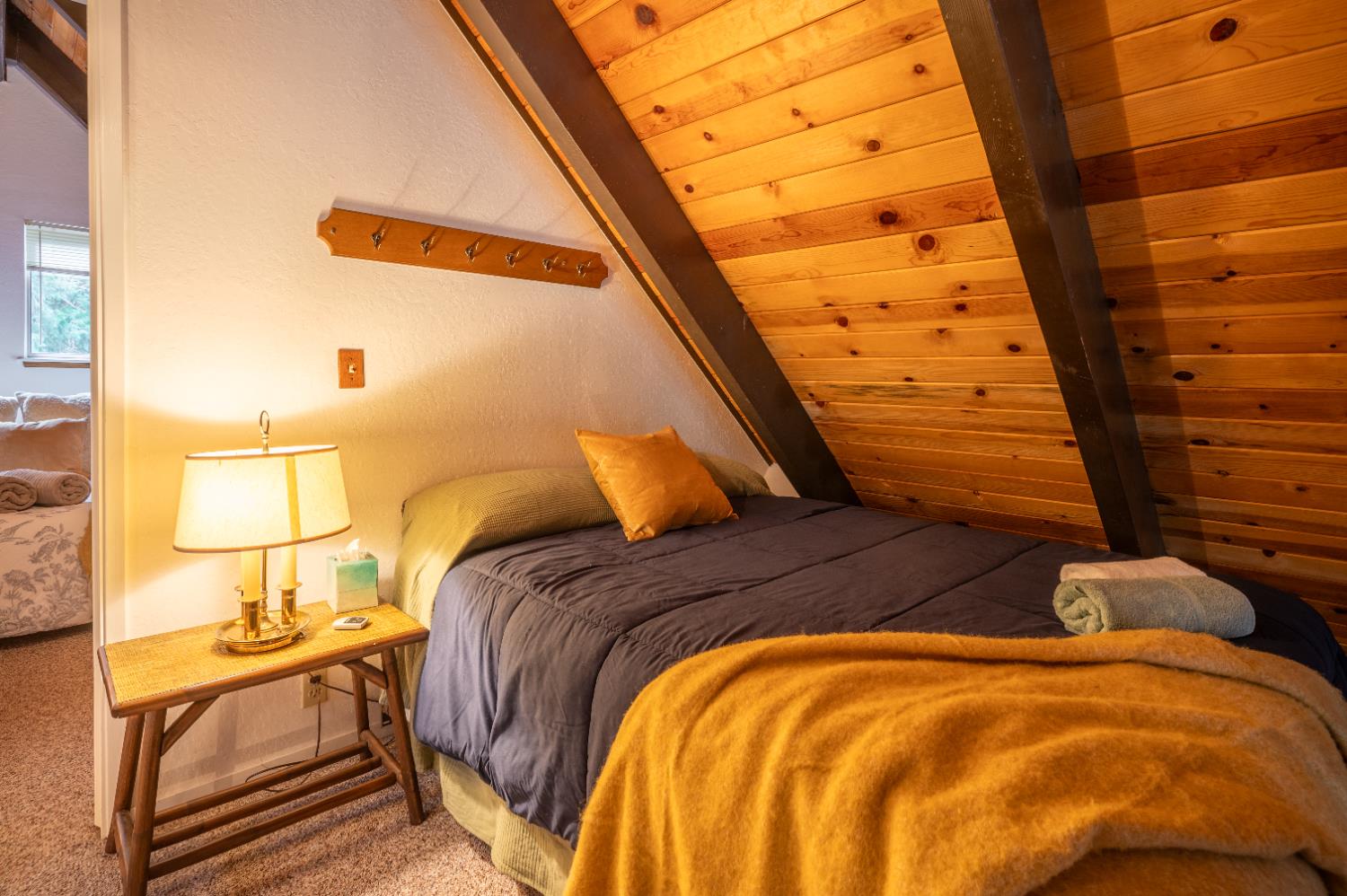 3790 Apache Road Arnold, CA 95223 - Photo 11 of 41 a bedroom with a bed and lamp