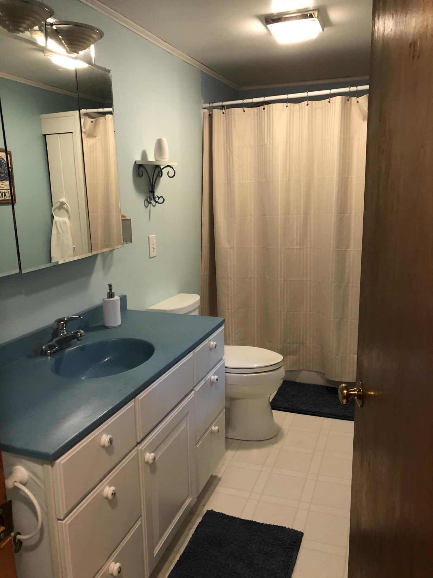 5 South South Road Lovell, ME 04051 - Photo 23 of 27 Lakehouse Blue Bathroom