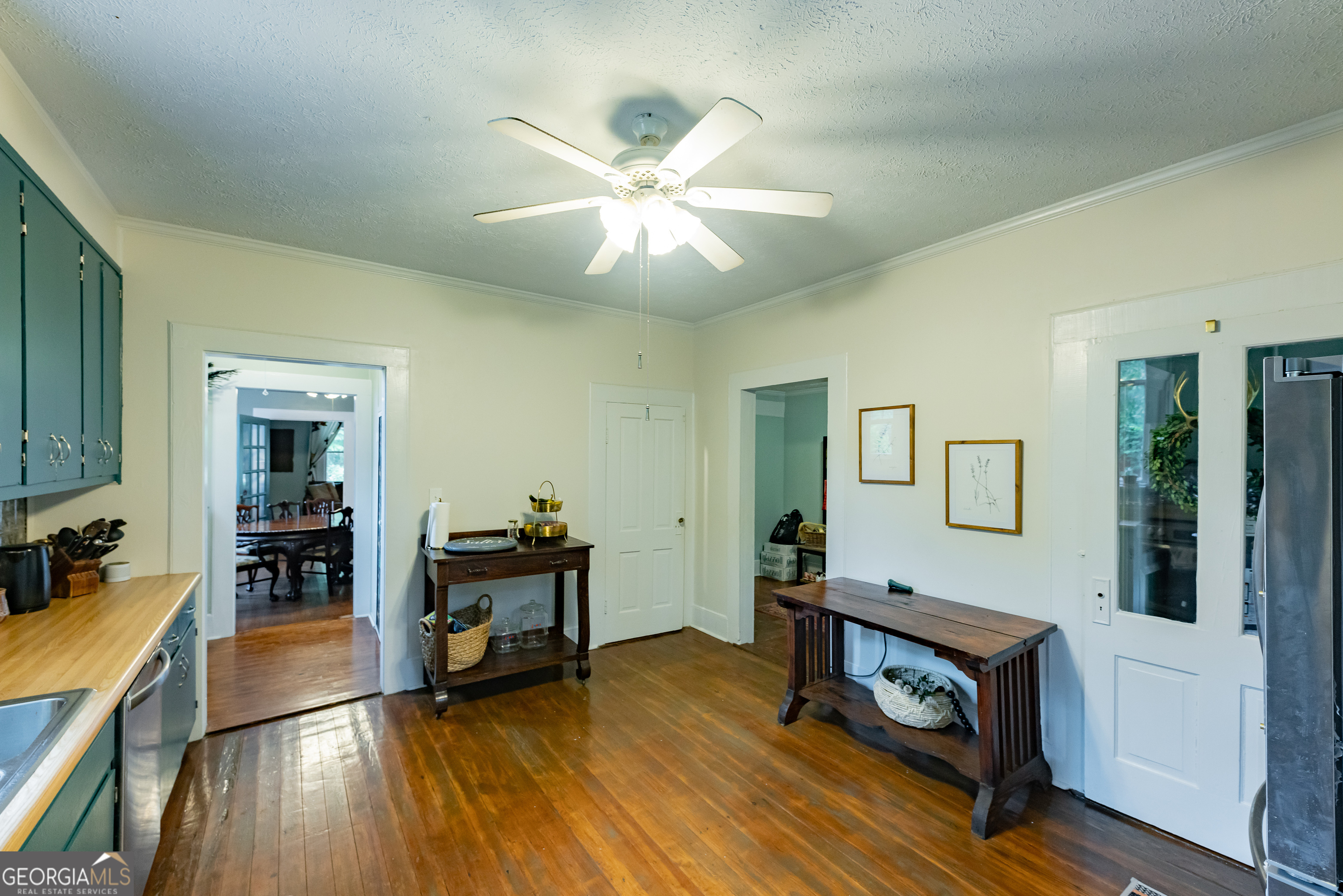308 Howell Street Thomaston, GA 30286 - Photo 11 of 46 a living room with furniture and a wooden floor