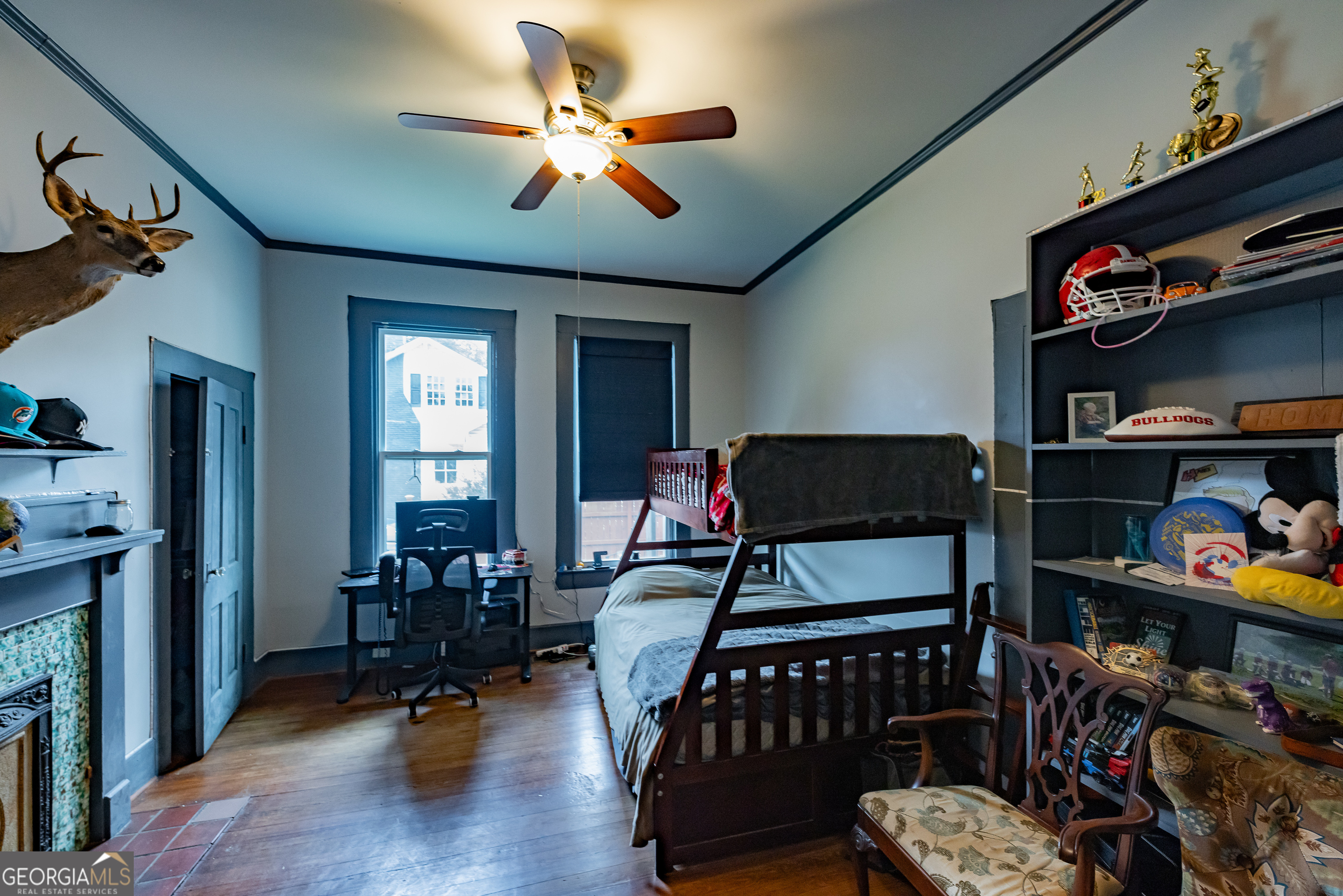308 Howell Street Thomaston, GA 30286 - Photo 17 of 46 a bedroom with furniture and a book shelf