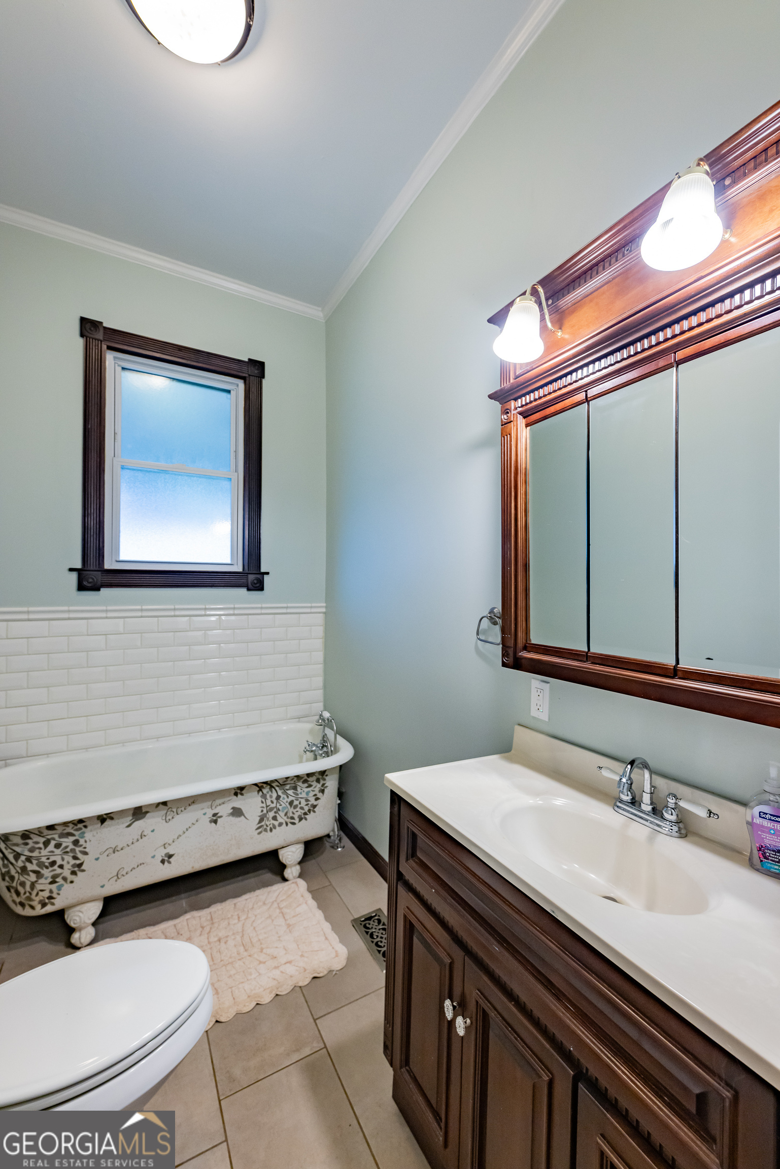308 Howell Street Thomaston, GA 30286 - Photo 20 of 46 a bathroom with a sink and a mirror