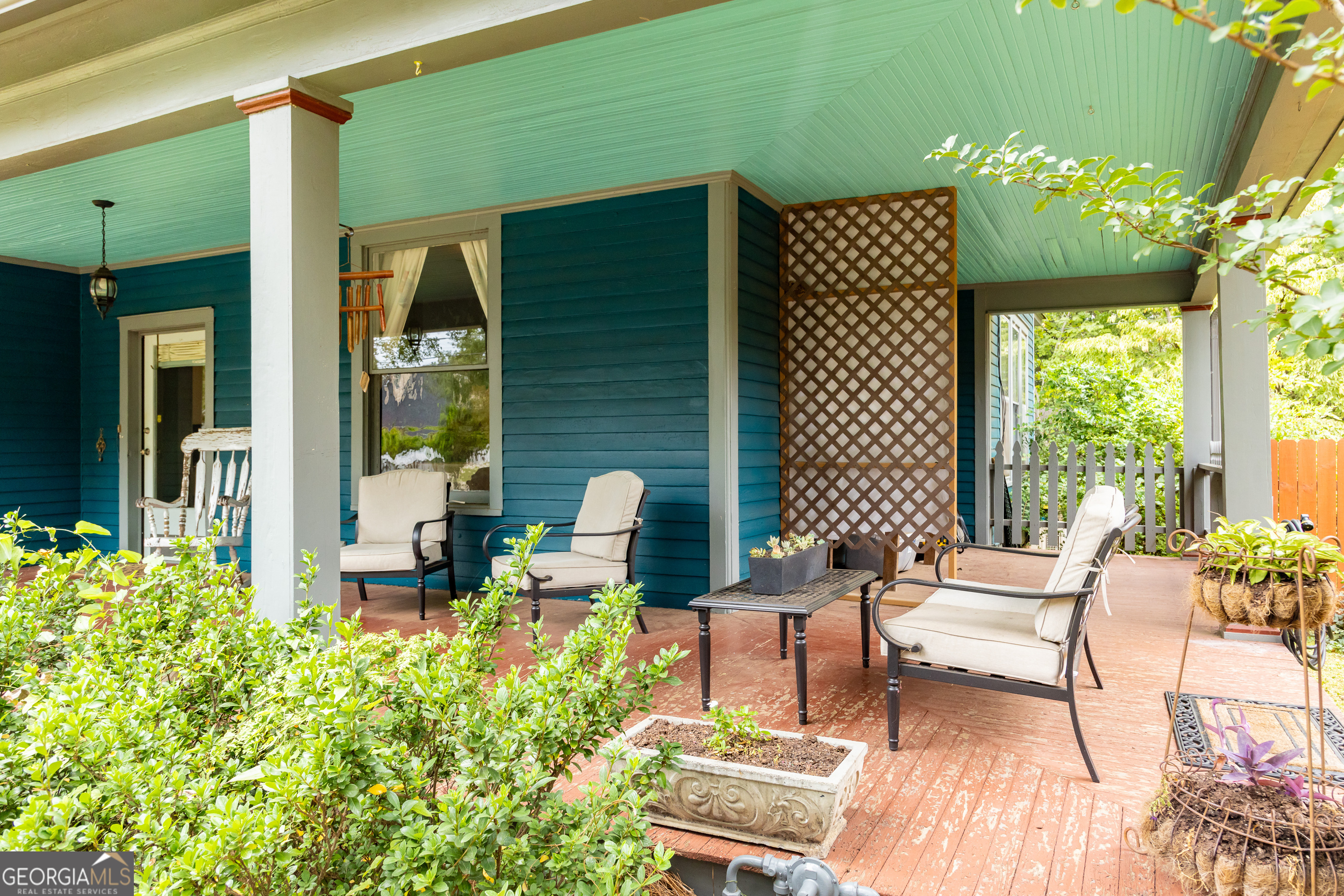 308 Howell Street Thomaston, GA 30286 - Photo 2 of 46 a outdoor living space with furniture and garden