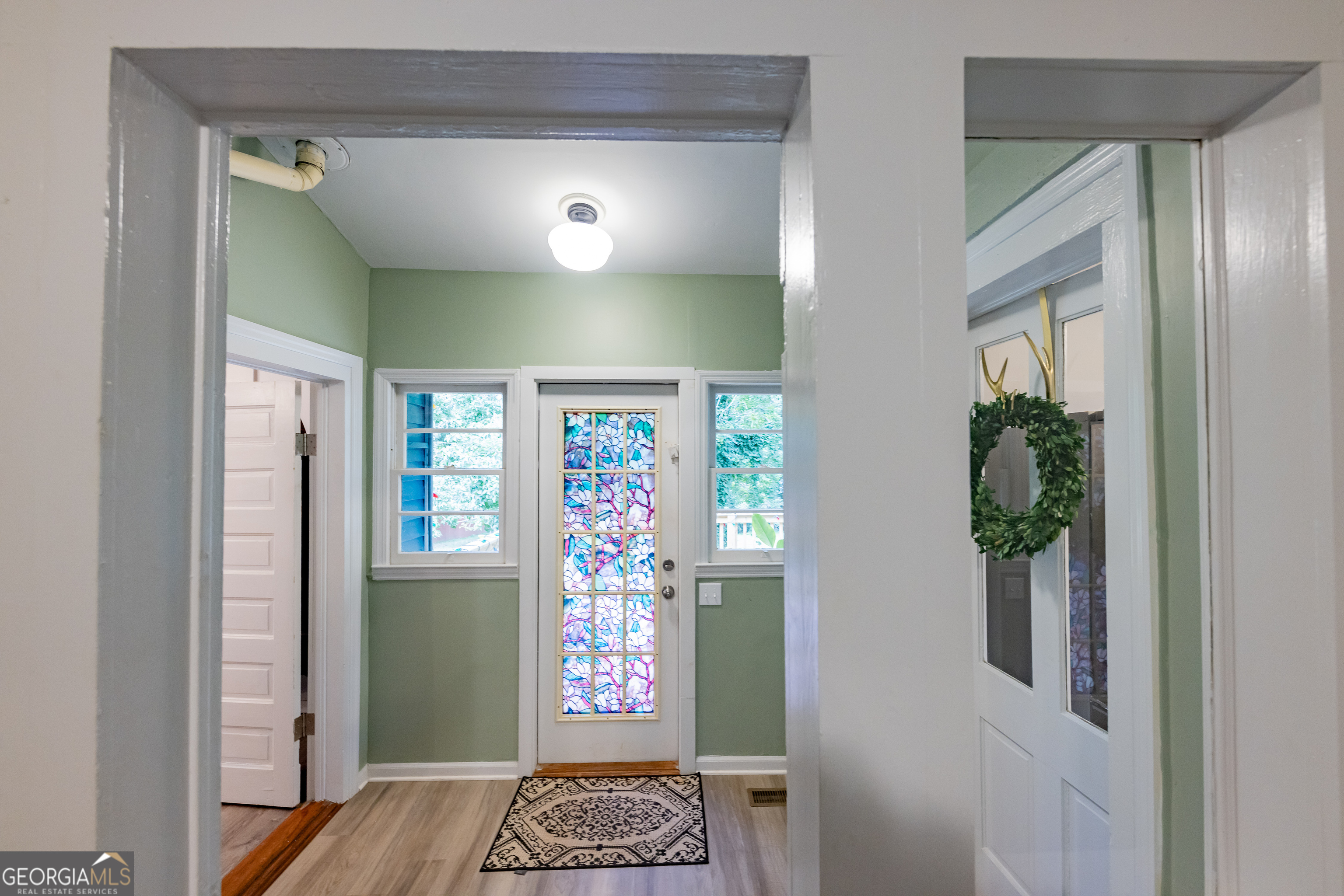 308 Howell Street Thomaston, GA 30286 - Photo 24 of 46 a view of entryway with wooden floor