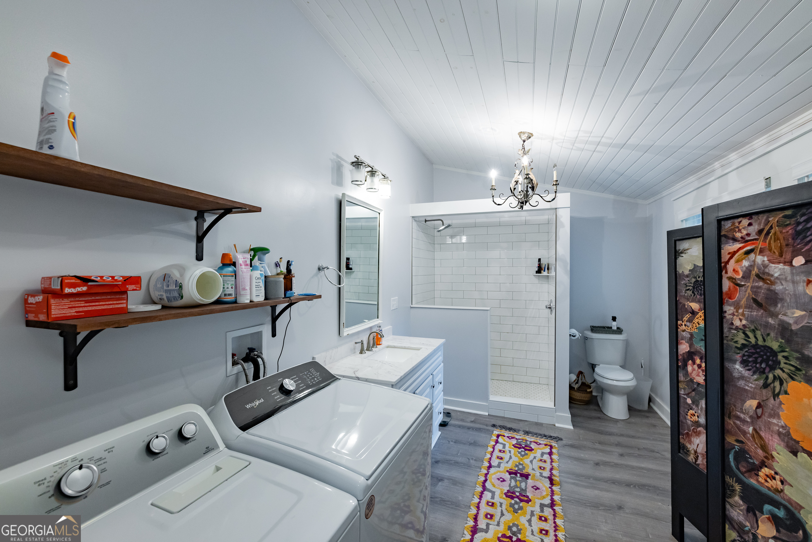 308 Howell Street Thomaston, GA 30286 - Photo 25 of 46 a living room with furniture and a flat screen tv