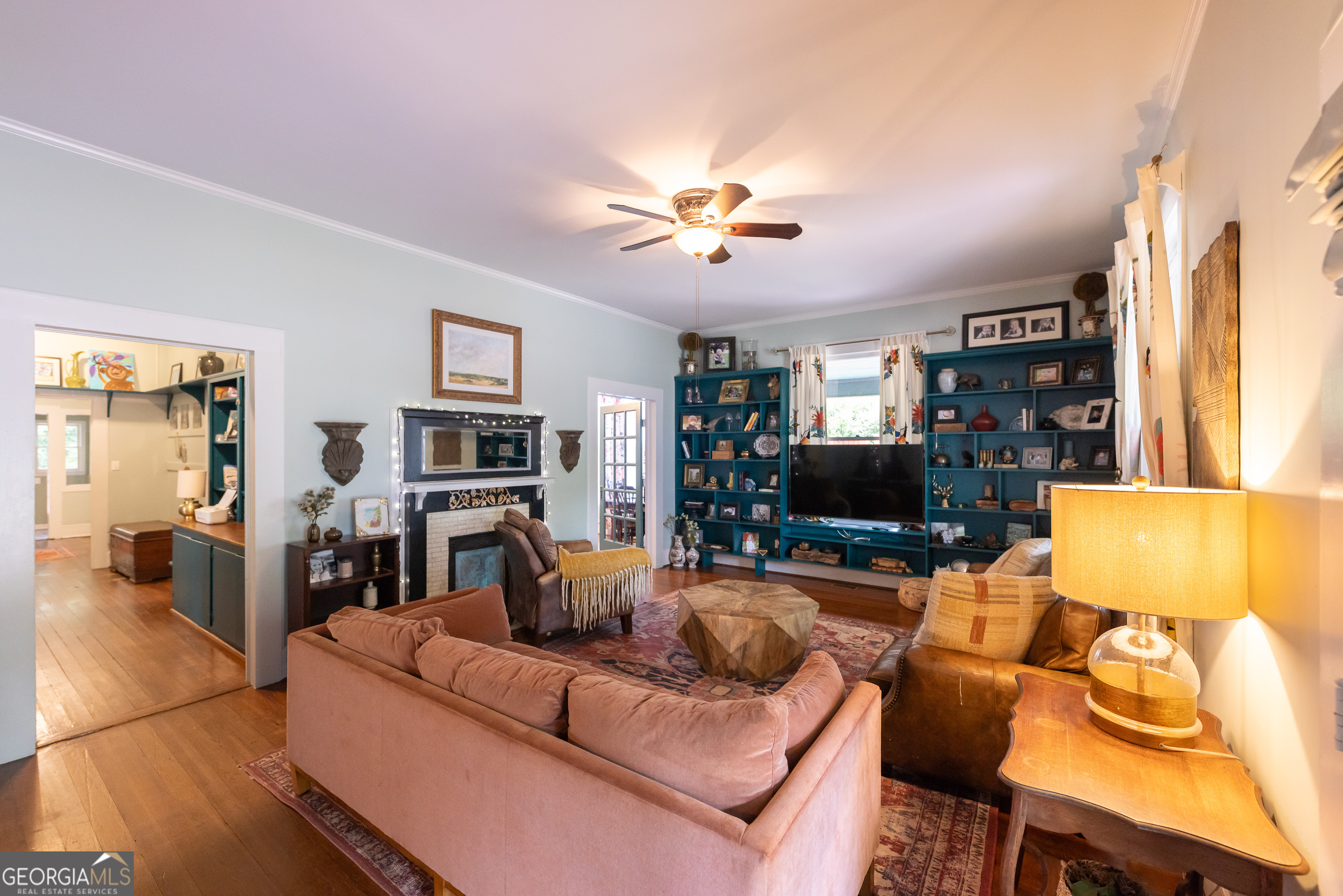 308 Howell Street Thomaston, GA 30286 - Photo 3 of 46 a living room with furniture and a flat screen tv