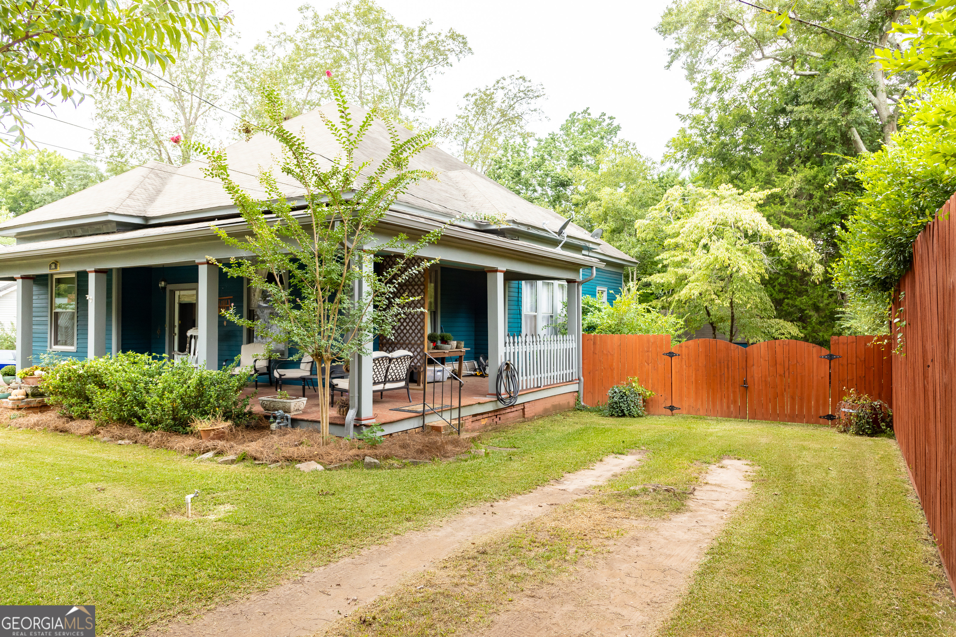 308 Howell Street Thomaston, GA 30286 - Photo 44 of 46 a view of a house with backyard porch and sitting area