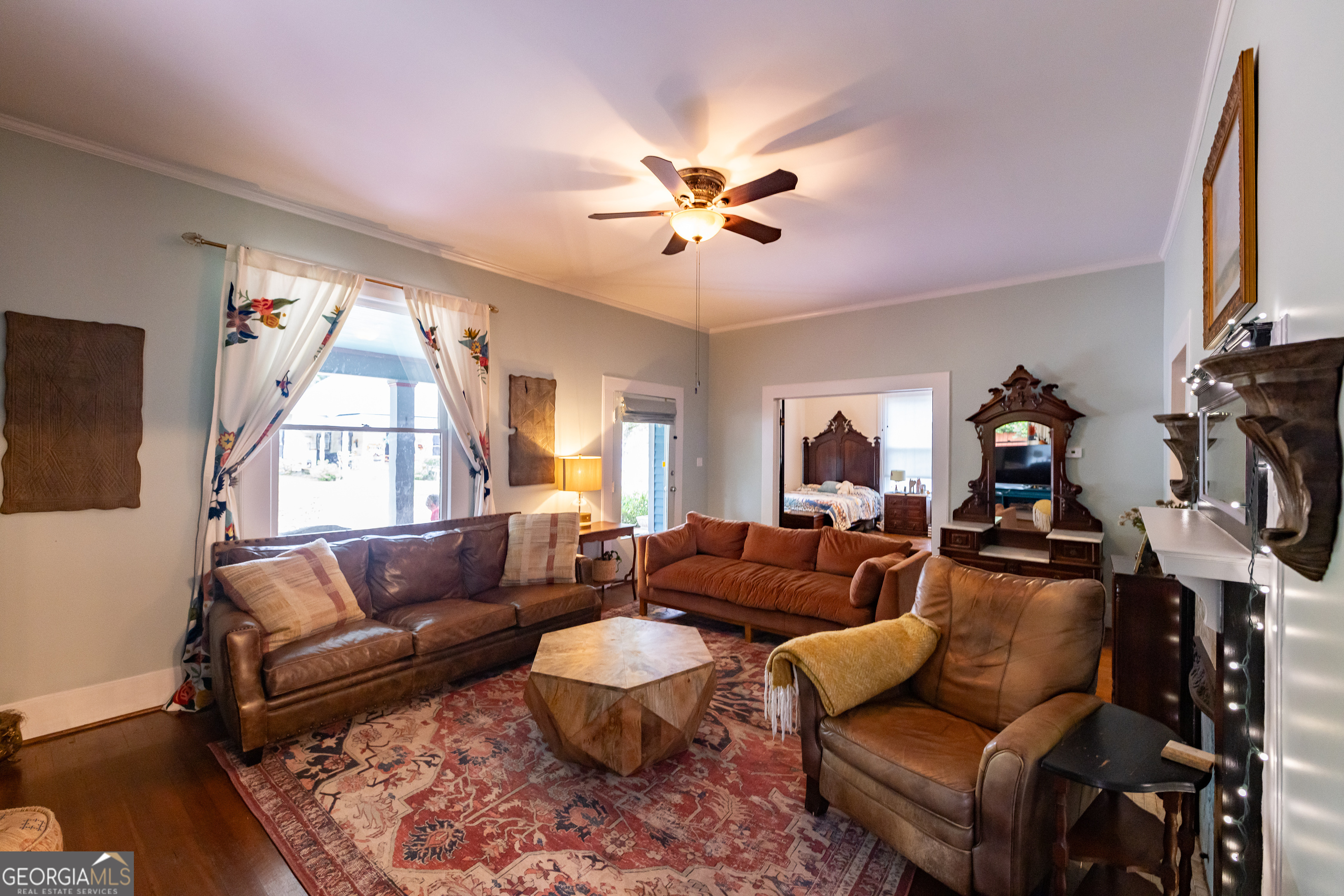308 Howell Street Thomaston, GA 30286 - Photo 5 of 46 a living room with furniture a ceiling fan and a rug