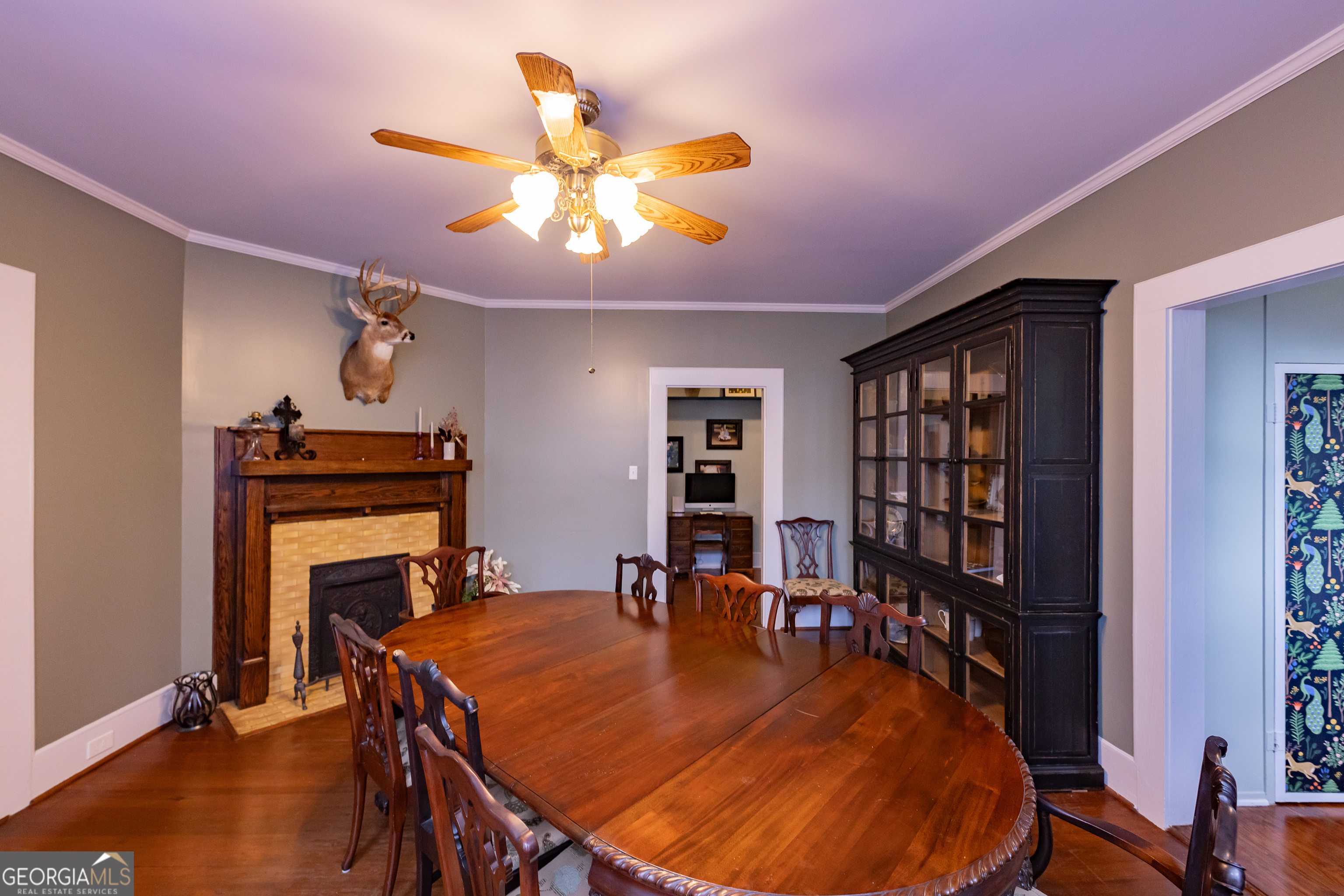 308 Howell Street Thomaston, GA 30286 - Photo 7 of 46 a view of a dining room with furniture and wooden floor