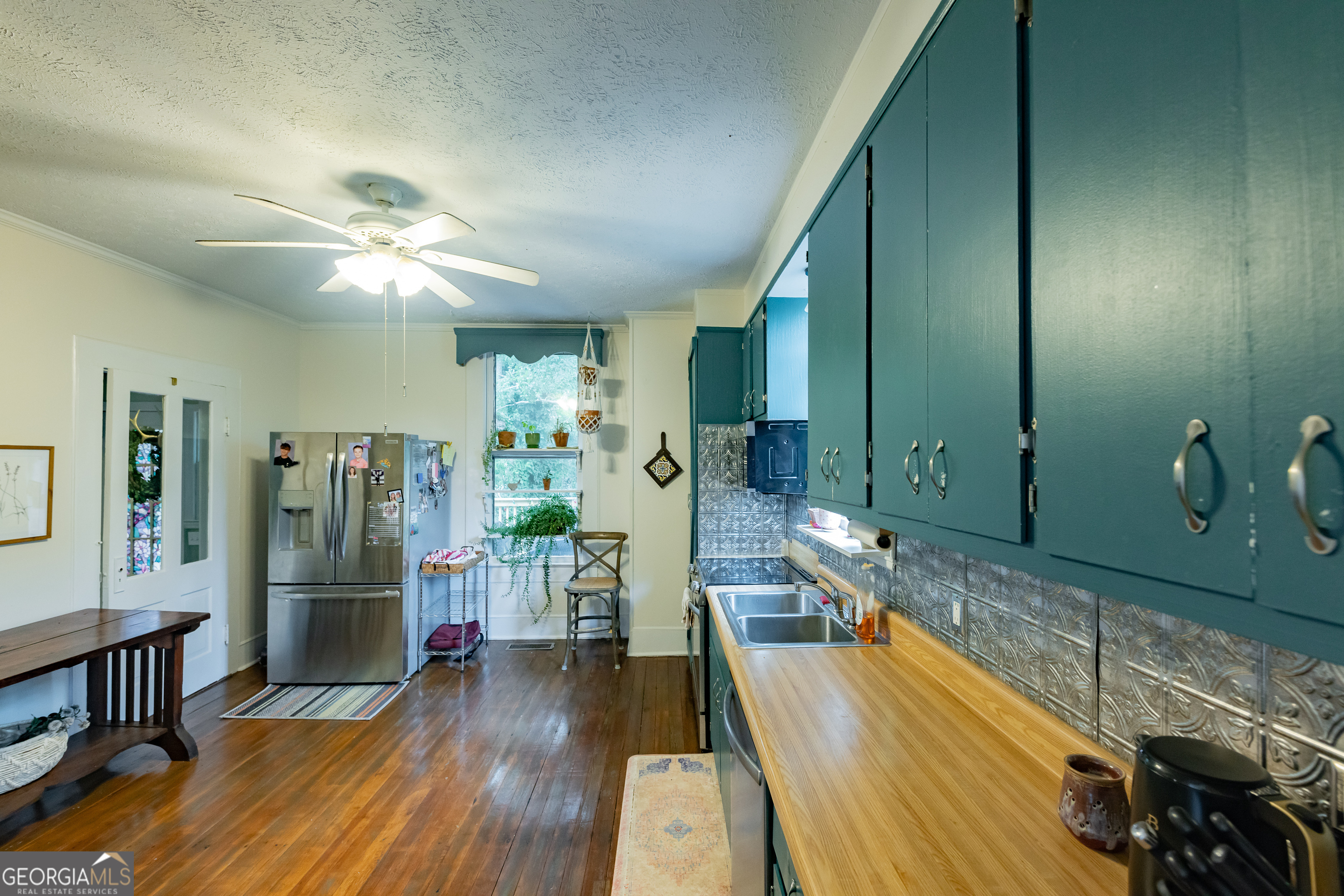 308 Howell Street Thomaston, GA 30286 - Photo 10 of 46 a spacious bathroom with a granite countertop sink a mirror and shower
