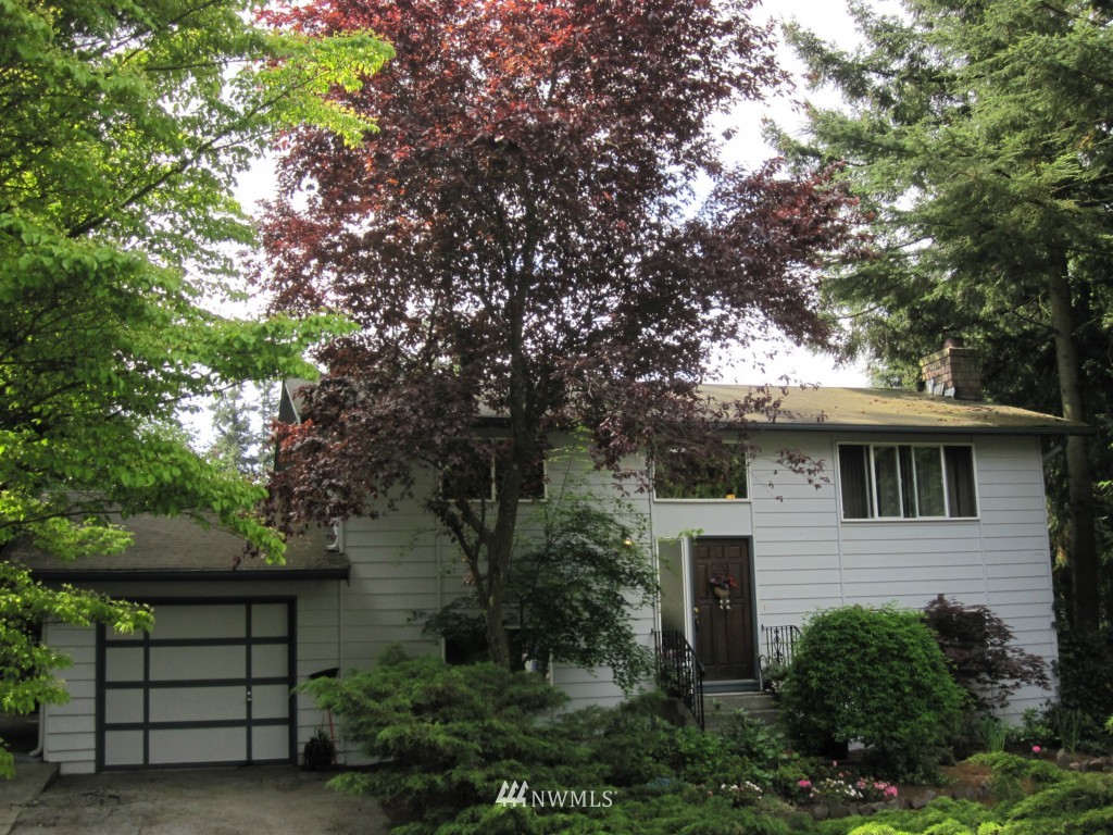 21424 6th Avenue West Bothell, WA 98021 - Photo 1 of 1 a view of house with a trees