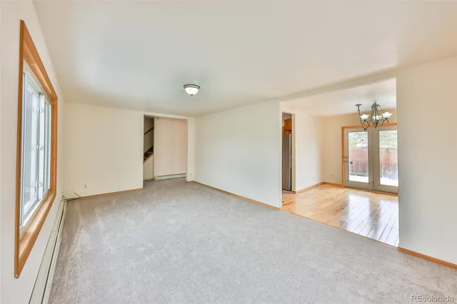 an empty room with windows