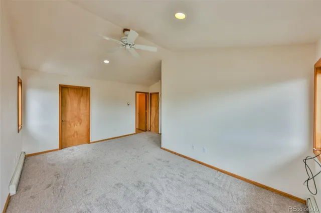 a bathroom with a double vanity sink a mirror and a shower