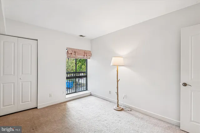 a view of a street with an outdoor space