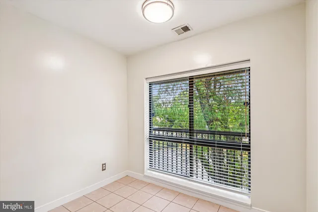 a view of a room with windows