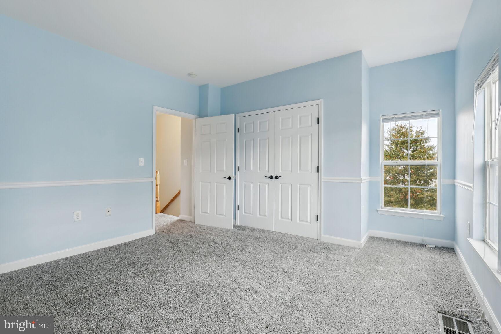 42379 Goldenseal Square Brambleton, VA 20148 - Photo 11 of 20 an empty room with windows
