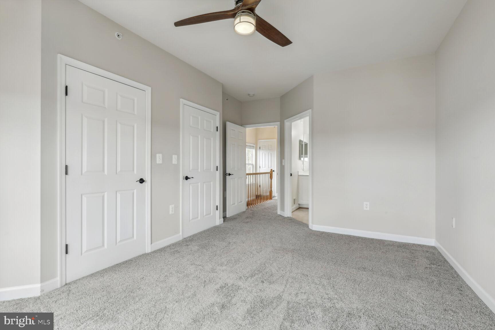42379 Goldenseal Square Brambleton, VA 20148 - Photo 14 of 20 a view of empty room with a ceiling fan