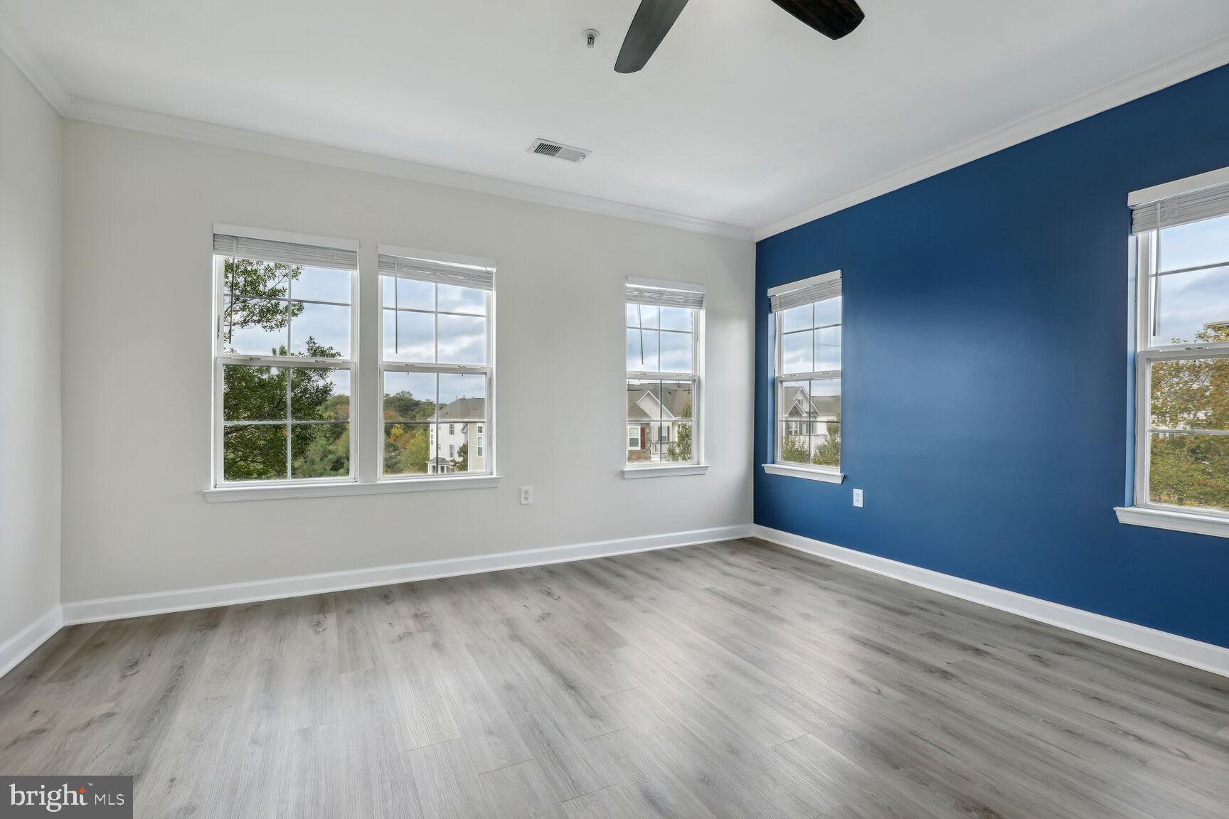 42379 Goldenseal Square Brambleton, VA 20148 - Photo 6 of 20 an empty room with windows