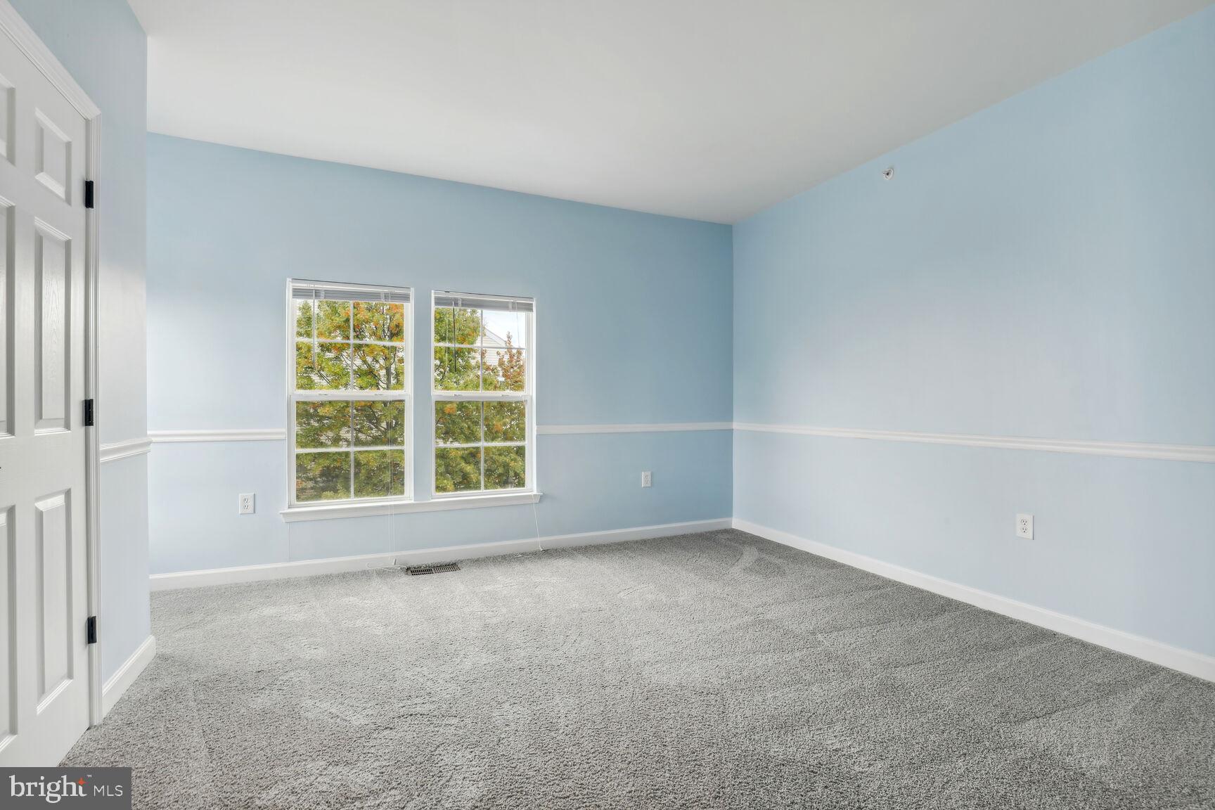 42379 Goldenseal Square Brambleton, VA 20148 - Photo 10 of 20 an empty room with a window