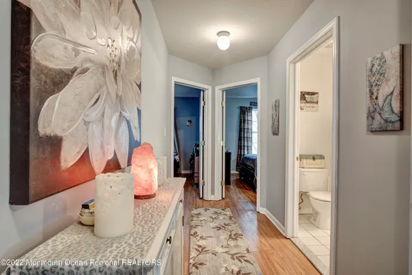a bathroom with a sink and shower curtain
