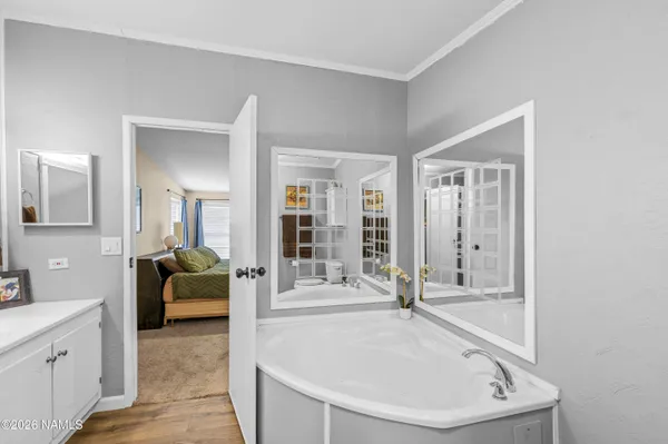 a room with gym equipment and windows