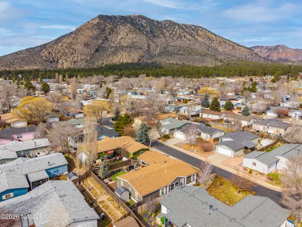 a front view of a house with outdoor space