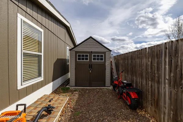 a view of outdoor space and wooden deck