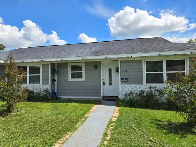 a view of a house with garden