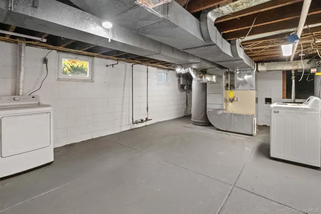a picture of a wall with a black and white kitchen