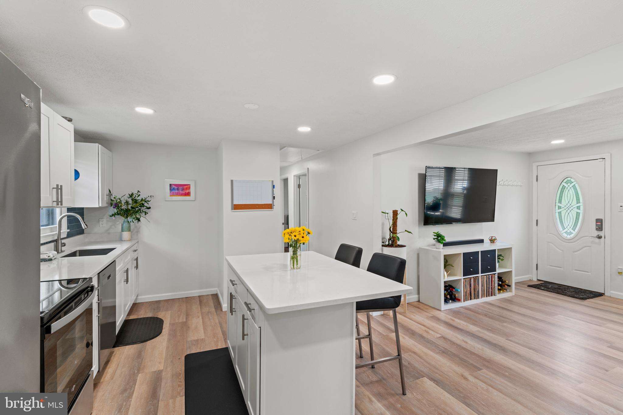 701 Eucla Drive Waldorf, MD 20601 - Photo 11 of 23 a living room with furniture and a flat screen tv