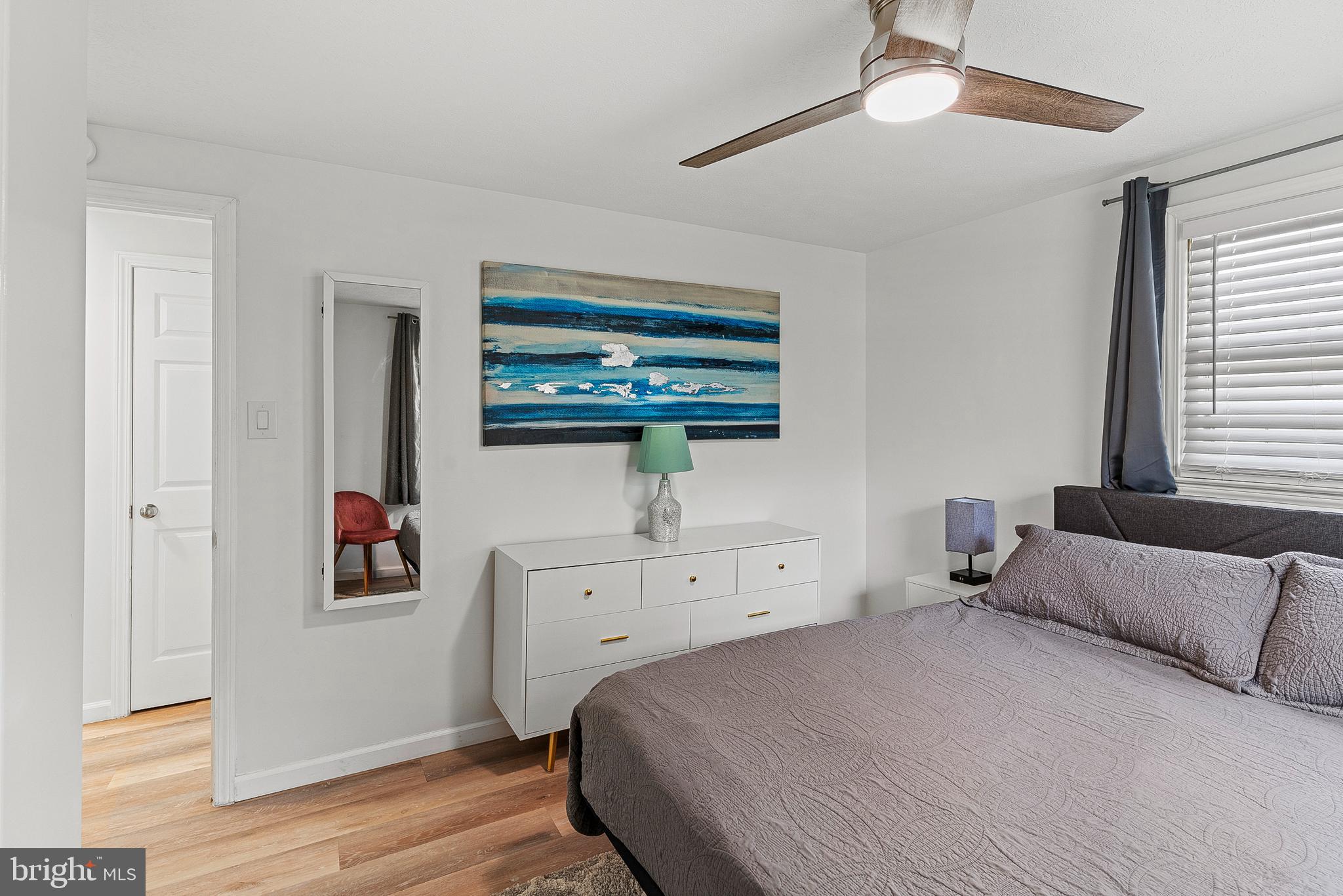 701 Eucla Drive Waldorf, MD 20601 - Photo 15 of 23 a bedroom with a bed and wooden floor