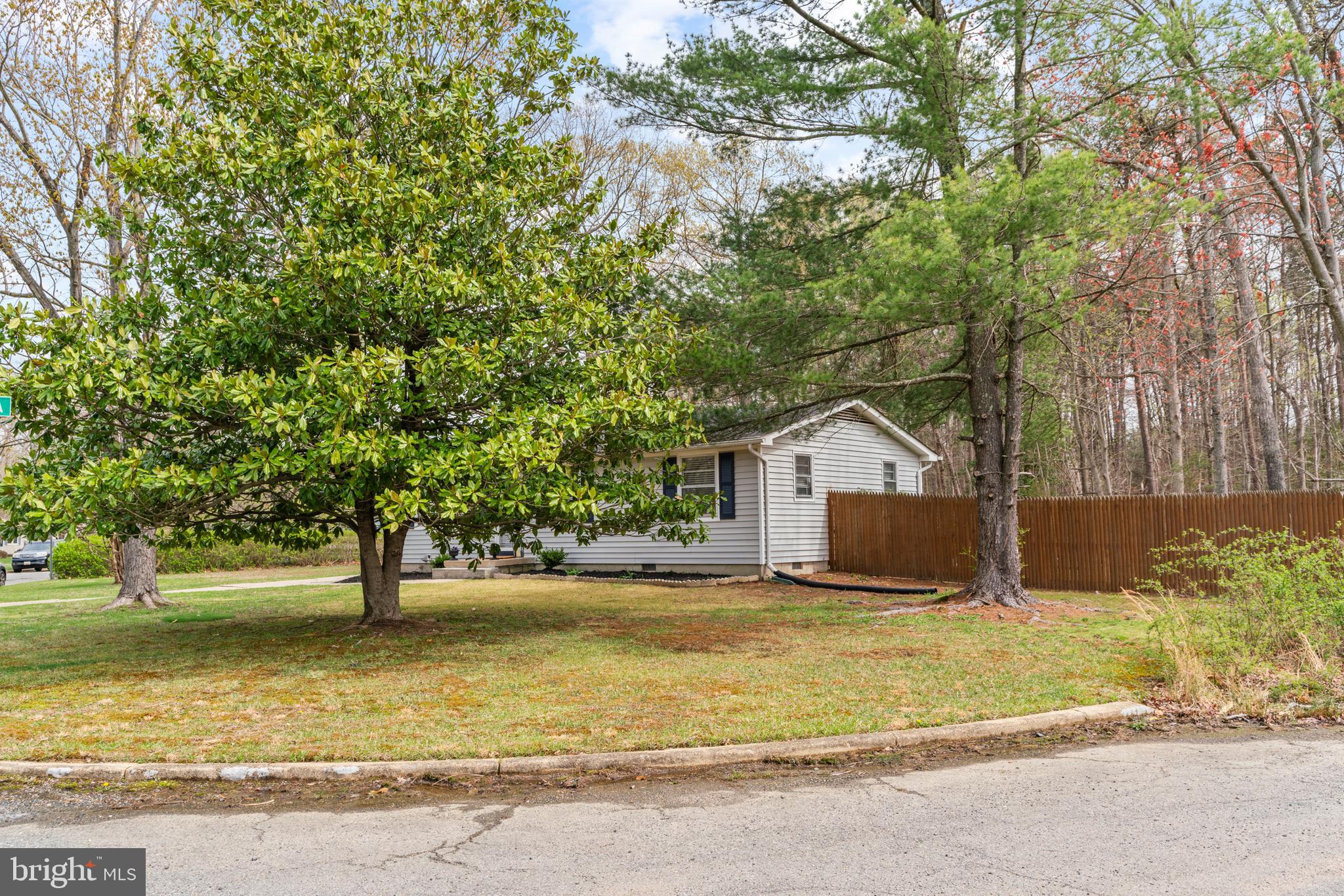701 Eucla Drive Waldorf, MD 20601 - Photo 3 of 23 a house that has a tree in front of it