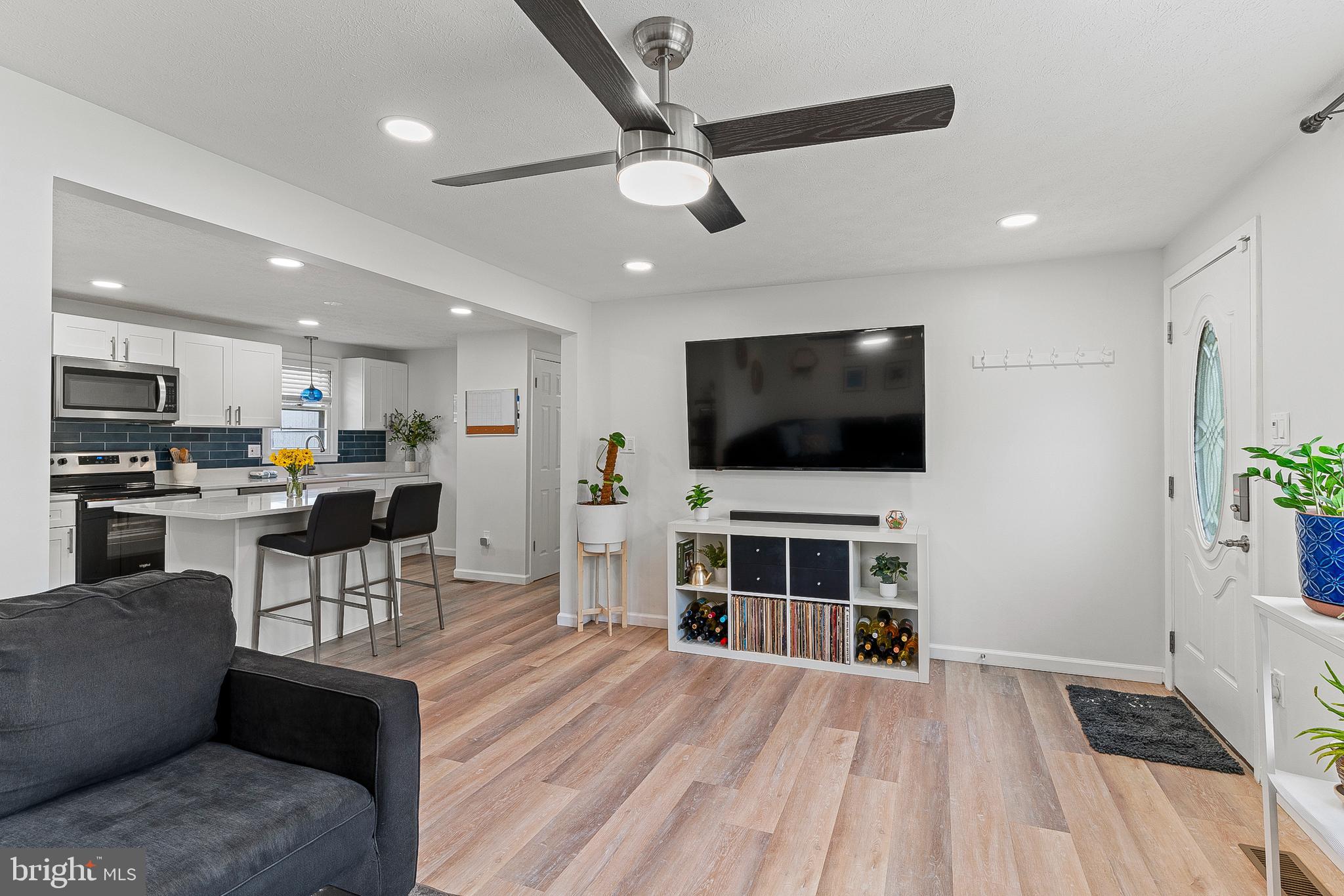 701 Eucla Drive Waldorf, MD 20601 - Photo 8 of 23 a living room with furniture and a flat screen tv