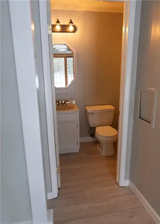 a bathroom with a toilet and a sink