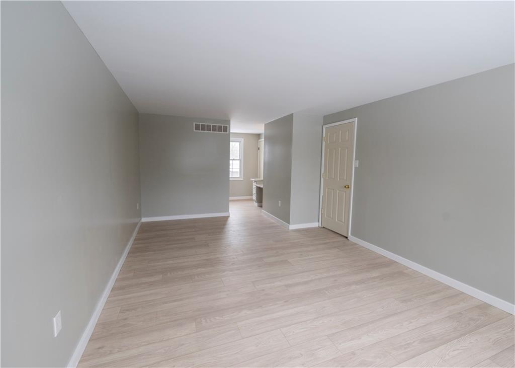 855 2nd Avenue Freedom, PA 15042 - Photo 20 of 42 a view of an empty room and wooden floor