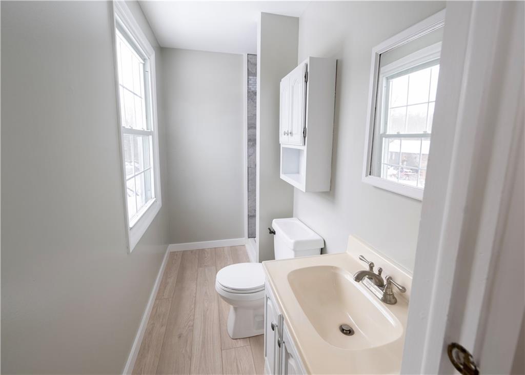 855 2nd Avenue Freedom, PA 15042 - Photo 24 of 42 a bathroom with a sink a toilet and tub