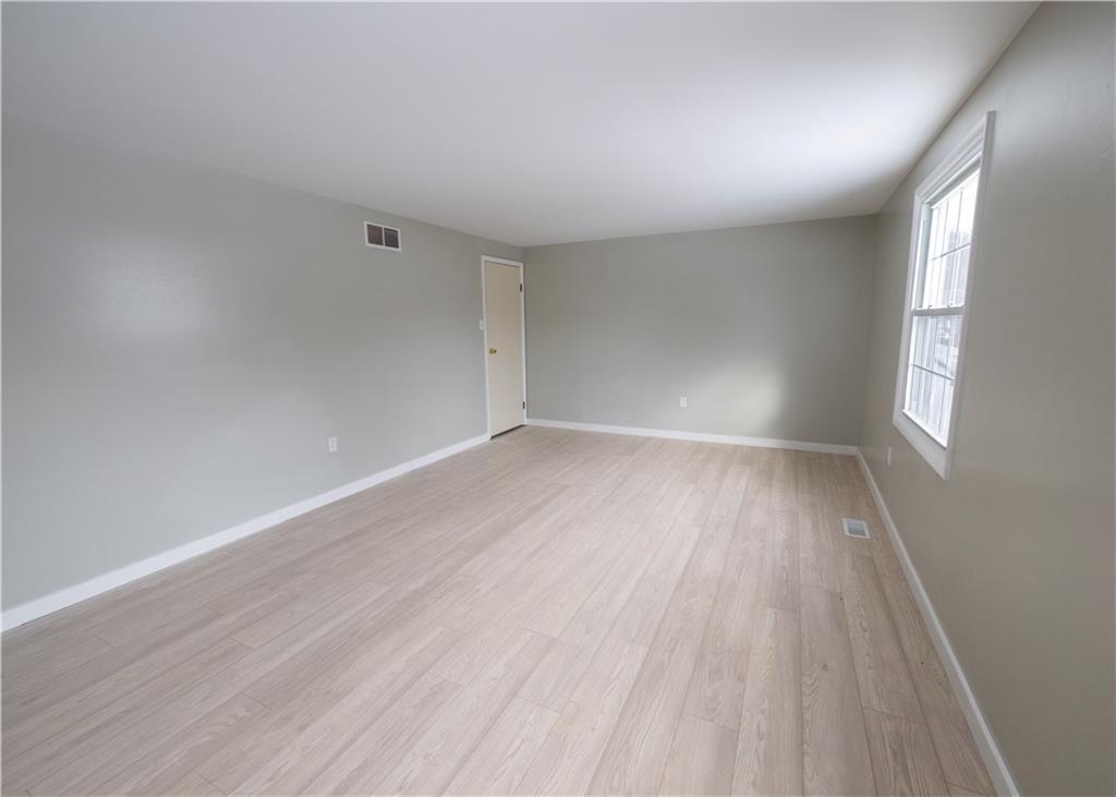855 2nd Avenue Freedom, PA 15042 - Photo 27 of 42 wooden floor in an empty room with a window