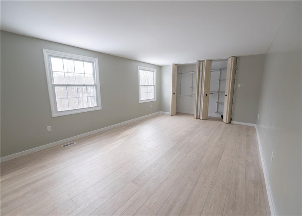 855 2nd Avenue Freedom, PA 15042 - Photo 28 of 42 an empty room with wooden floor and windows