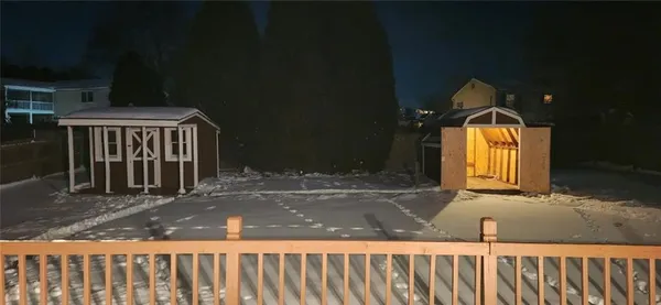 a view of swimming pool with outdoor seating