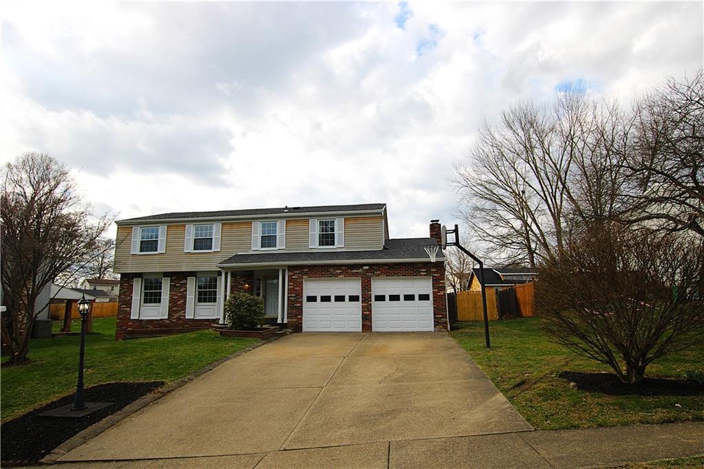 855 2nd Avenue Freedom, PA 15042 - Photo 42 of 42 a front view of a house with a yard and garage