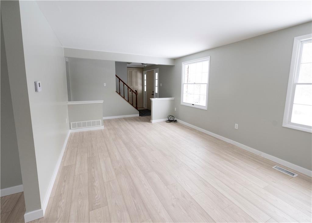 855 2nd Avenue Freedom, PA 15042 - Photo 6 of 42 wooden floor in an empty room with a window