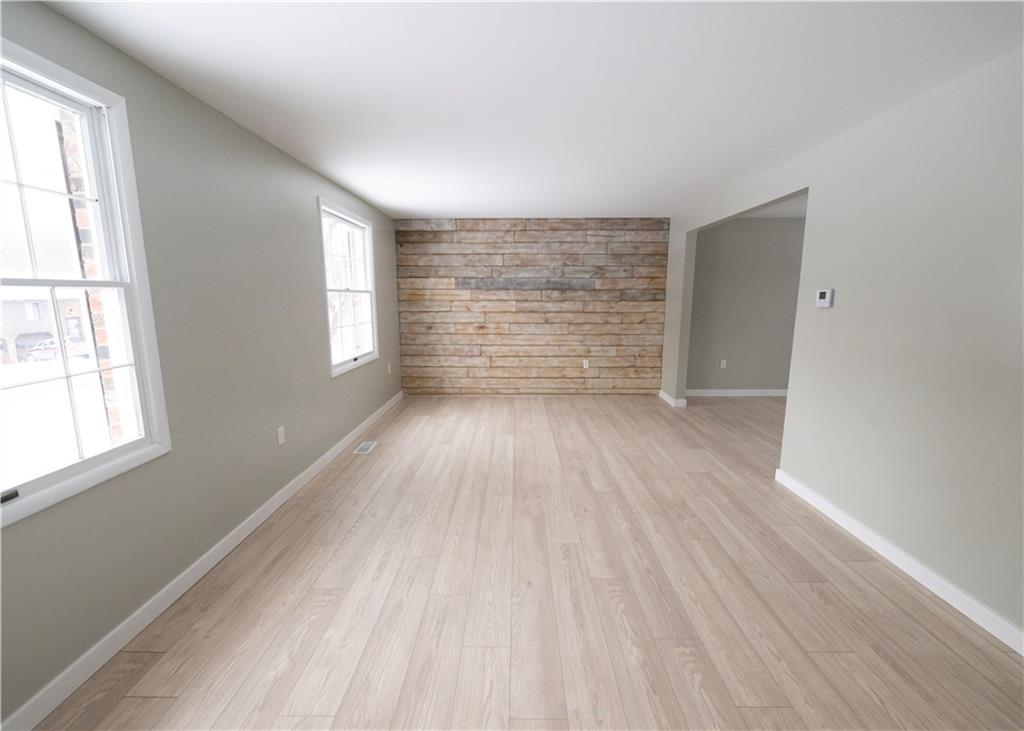 855 2nd Avenue Freedom, PA 15042 - Photo 7 of 42 wooden floor in an empty room with a window