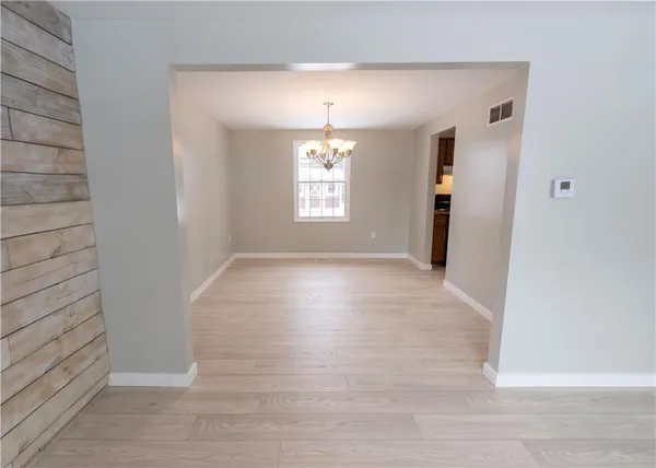 a view of livingroom with hardwood floor and window