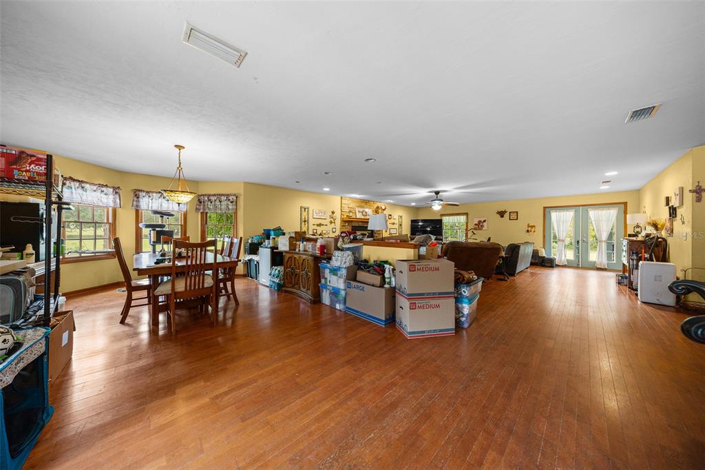 732 Carl Wilson Road Fort White, FL 32038 - Photo 11 of 80 a living room with furniture and a large window