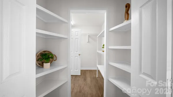 a view of entryway with wooden floor