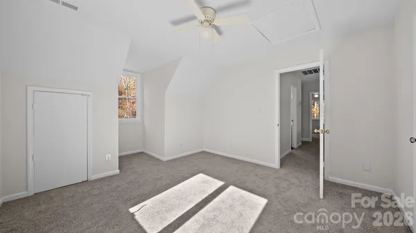 an entryway with a rug