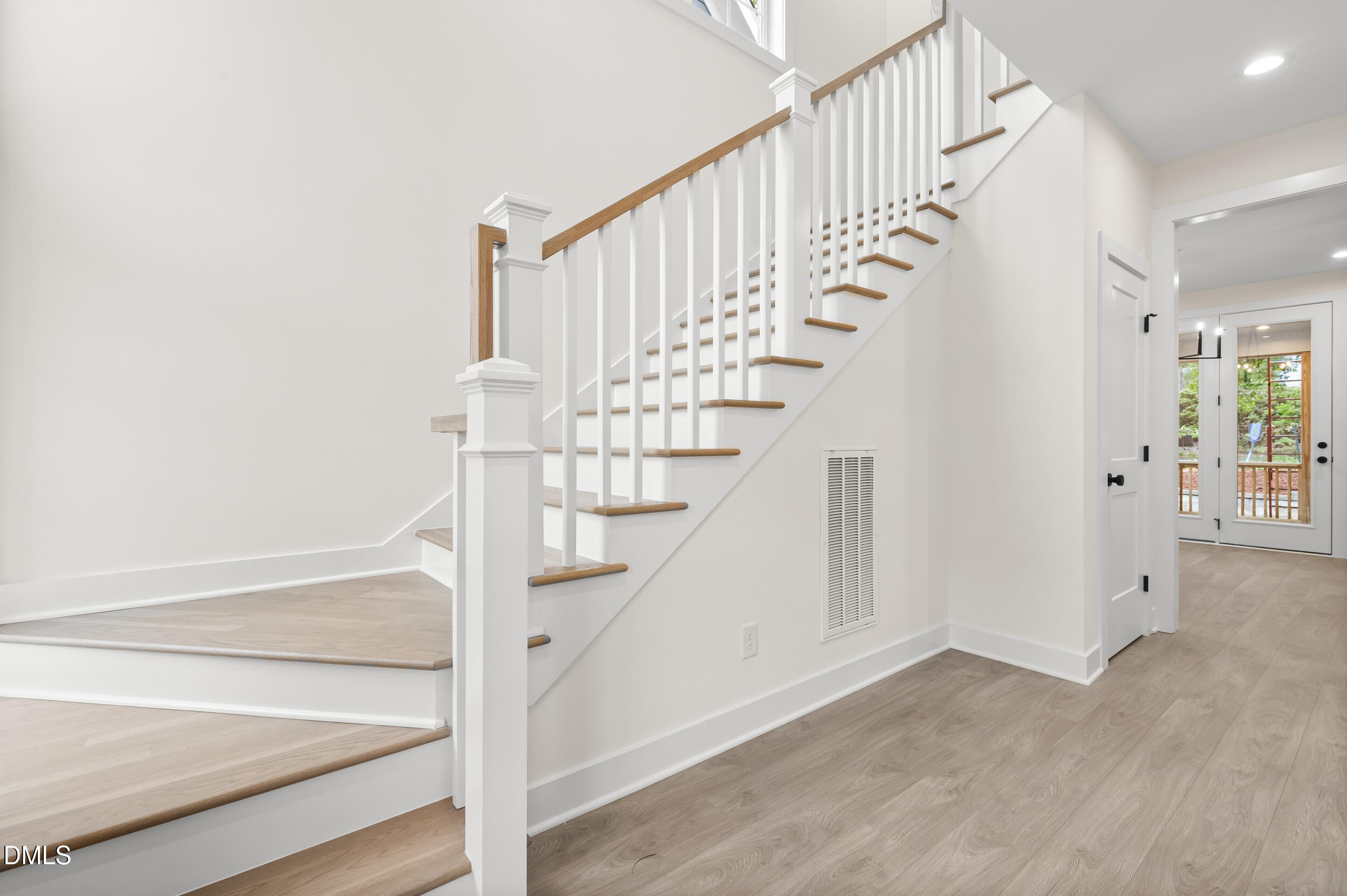 708 Grayhaven Place Raleigh, NC 27606 - Photo 3 of 33 a view of entryway with wooden floor
