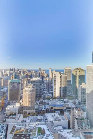 a view of a city with tall buildings