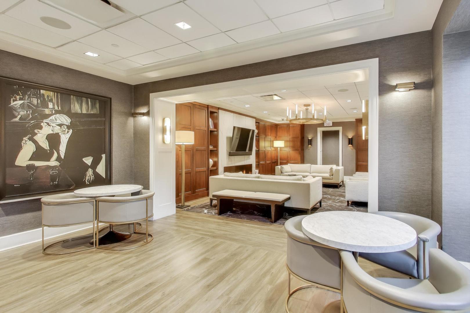 57 East Delaware Place, Unit 3504 Chicago, IL 60611 - Photo 28 of 45 a living room with furniture and a large window