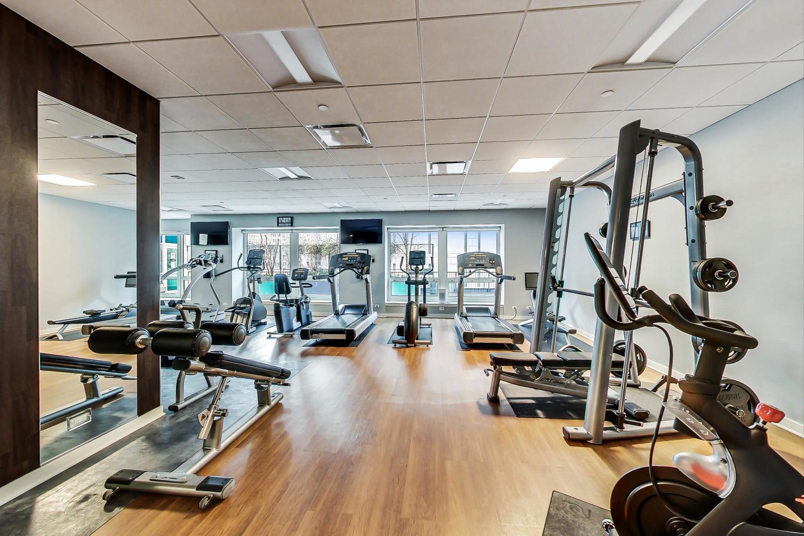 57 East Delaware Place, Unit 3504 Chicago, IL 60611 - Photo 38 of 45 a view of a room with gym equipment